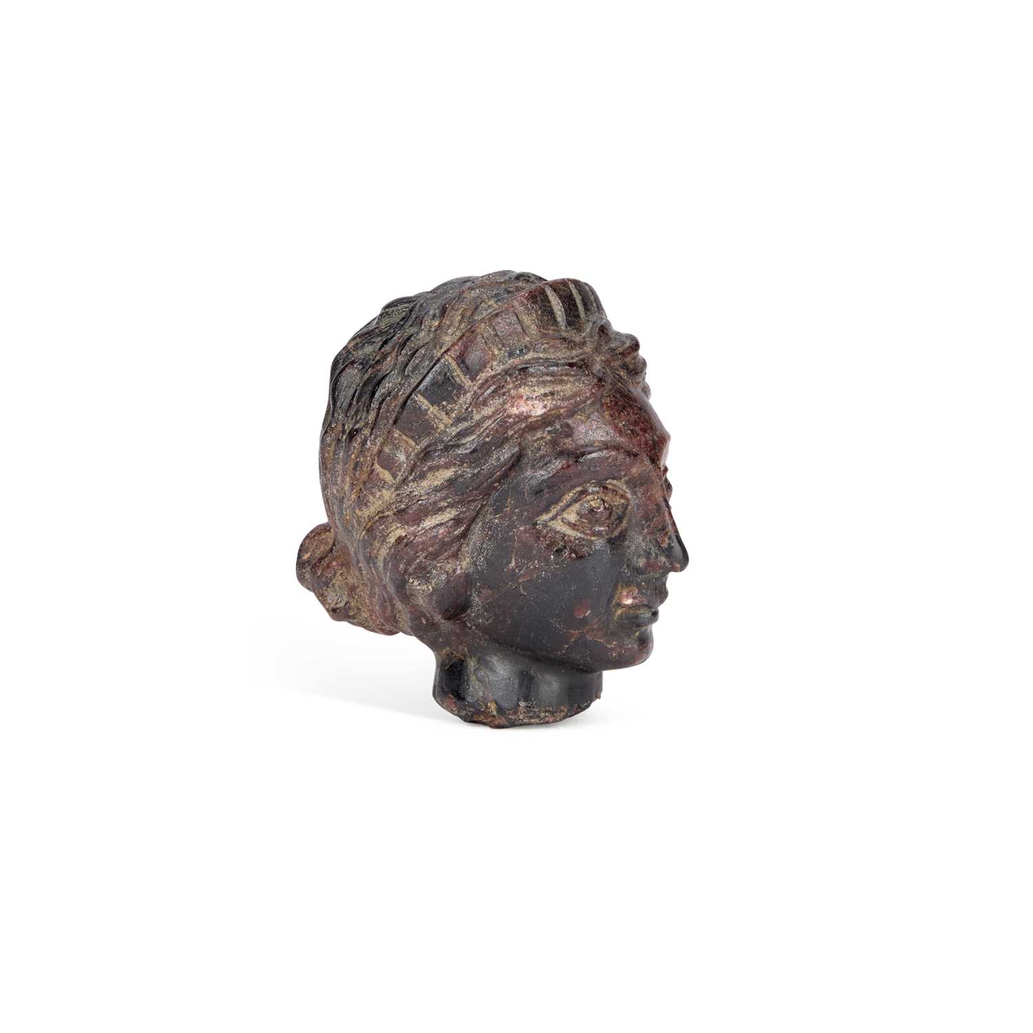 Lot 980 - A CARVED STONE HEAD OF A LADY