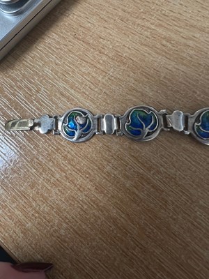 Lot 754 - AN ARTS AND CRAFTS SILVER AND ENAMEL PANEL BRACELET