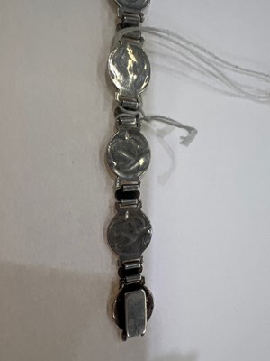 Lot 754 - AN ARTS AND CRAFTS SILVER AND ENAMEL PANEL BRACELET