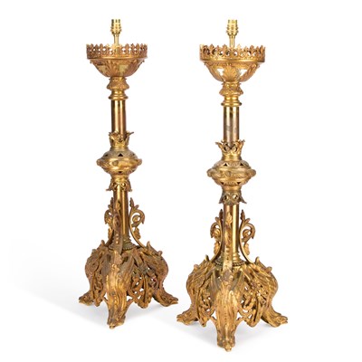 Lot A LARGE PAIR OF VICTORIAN GILT-BRASS LAMPS