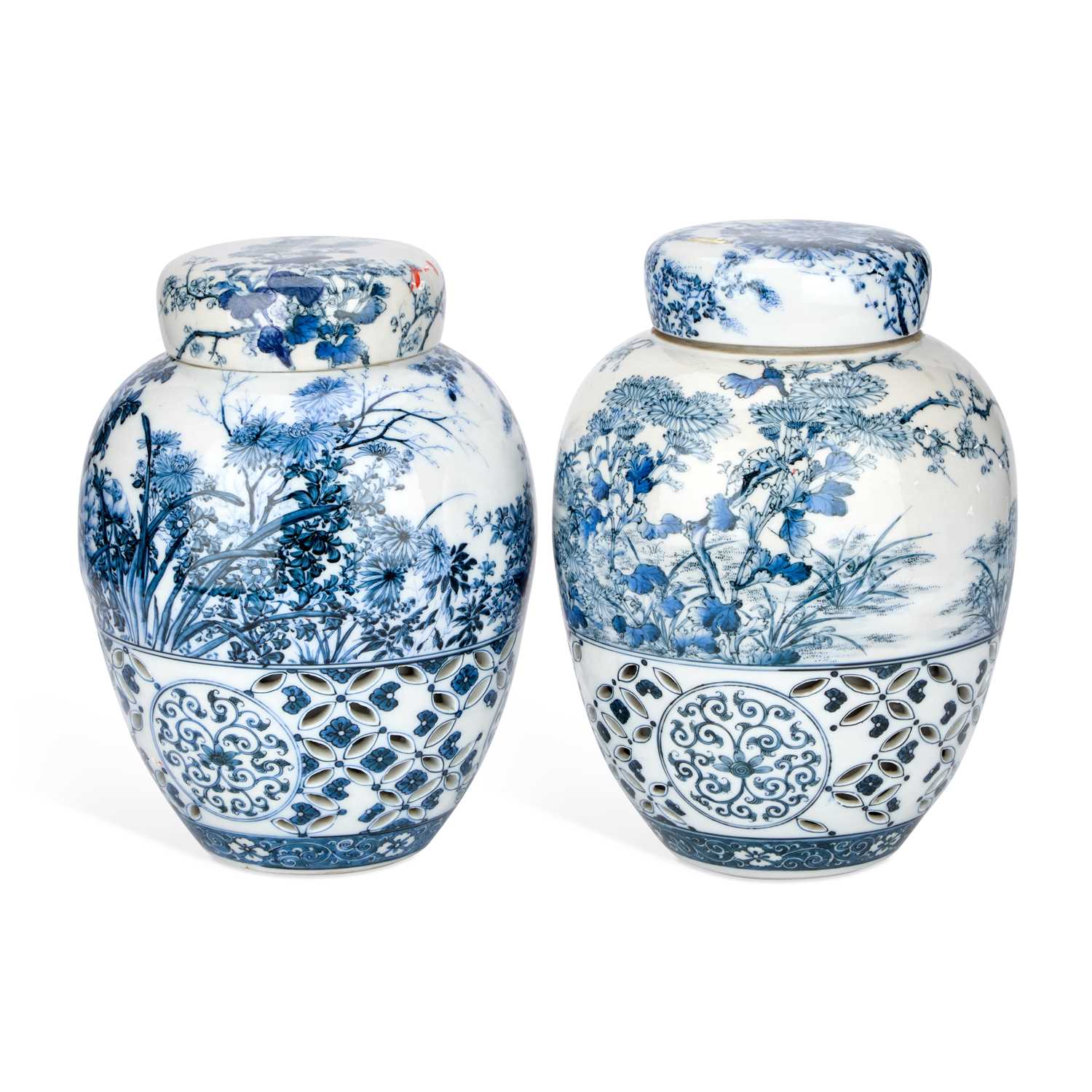Lot 674 - A PAIR OF JAPANESE RETICULATED PORCELAIN GINGER JARS AND COVERS