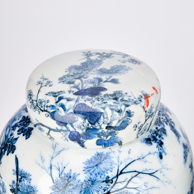 Lot 674 - A PAIR OF JAPANESE RETICULATED PORCELAIN GINGER JARS AND COVERS