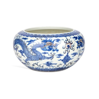 Lot 172 - A CHINESE BLUE AND WHITE PORCELAIN 'DRAGON AND WAVES' CENSER