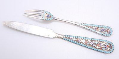 Lot 1038 - A RUSSIAN SILVER AND ENAMEL KNIFE AND FORK