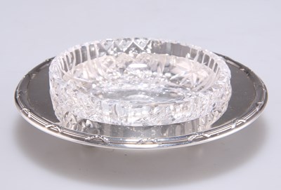 Lot 1444 - A GEORGE V SILVER AND CUT-GLASS TRINKET DISH