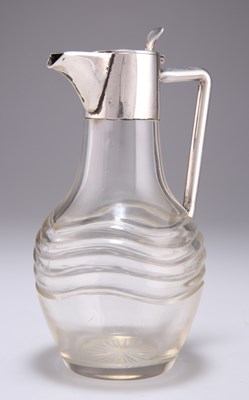 Lot 1063 - AN AUSTRO-HUNGARIAN SILVER-MOUNTED GLASS CLARET JUG