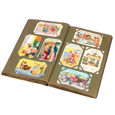 Lot 4 - AN ALBUM OF POSTCARDS