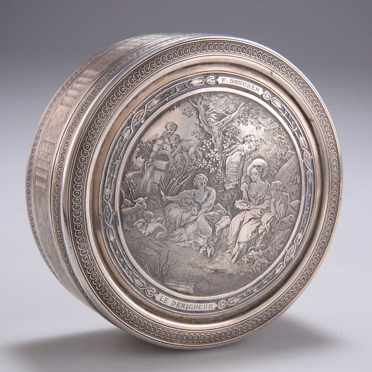 Lot 1080 - A FRENCH ENGRAVED SILVER CIRCULAR BOX