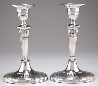 Lot 1369 - A PAIR OF LATE VICTORIAN SILVER CANDLESTICKS