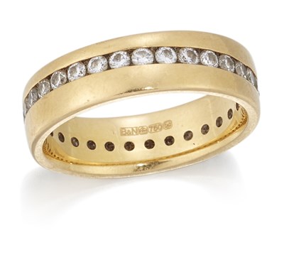 Lot 1578 - AN 18 CARAT GOLD DIAMOND ETERNITY RING