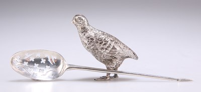 Lot 1249 - A MID-18TH CENTURY SILVER MOTE SPOON AND A SMALL SILVER MODEL OF A GROUSE