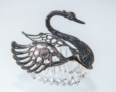 Lot 1269 - A GEORGE III SILVER RUM LABEL AND A CONTINENTAL SILVER AND GLASS SWAN BOWL