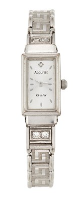 Lot 1523 - A 9 CARAT WHITE GOLD ACCURIST QUARTZ WATCH