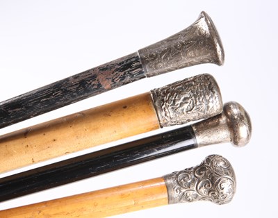 Lot 263 - FOUR WALKING CANES