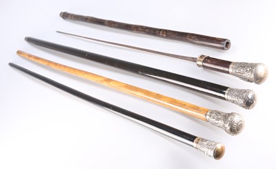 Lot 347 - FOUR WALKING CANES