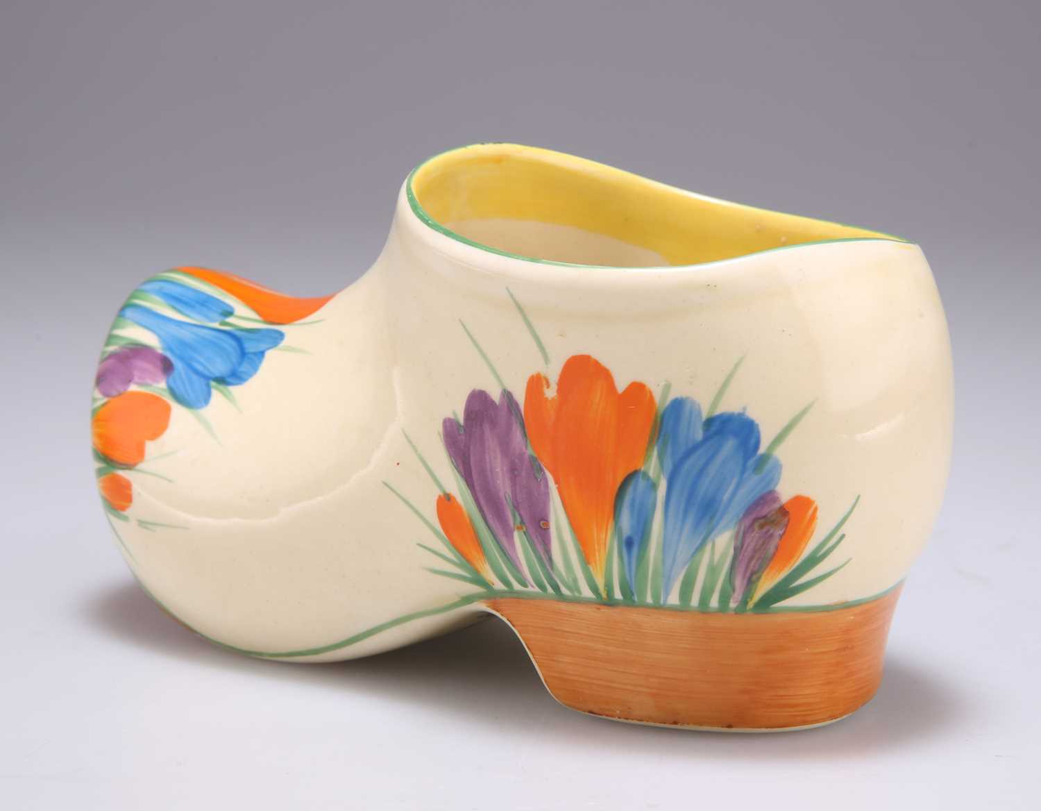 Lot 128 - A CLARICE CLIFF BIZARRE CROCUS PATTERN SABOT CLOG