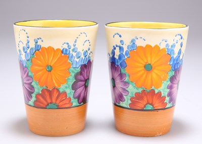 Lot 148 - A PAIR OF CLARICE CLIFF BIZARRE GAYDAY PATTERN BEAKERS