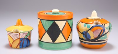 Lot 138 - TWO CLARICE CLIFF PRESERVE POTS AND A CONDIMENT POT