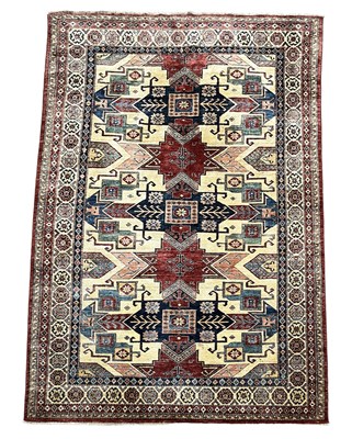 Lot 383 - A TURKISH CARPET