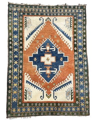 Lot 315 - AN ORIENTAL TRIBAL RUG