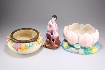 Lot 158 - TWO CLARICE CLIFF PLANTERS / BOWLS AND A FIGURAL FLOWER BLOCK