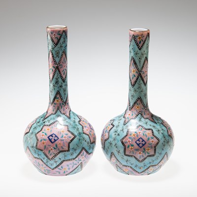 Lot 42 - A PAIR OF 19TH CENTURY MOROCCAN WARE HARRACH GLASS BOTTLE VASES