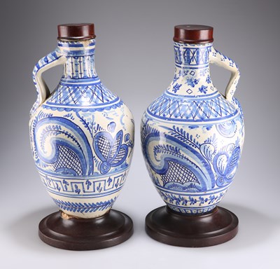 Lot 92 - A PAIR OF LATE 19TH / EARLY 20TH CENTURY BLUE AND WHITE DELFT TIN GLAZE JARS