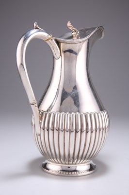 Lot 1225 - A VICTORIAN SILVER HOT WATER JUG