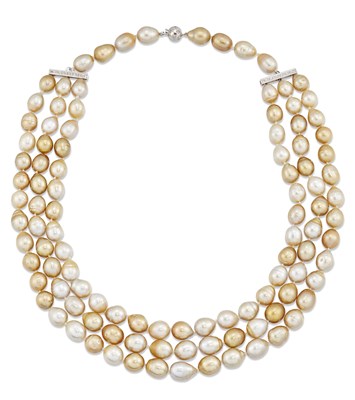 Lot 1434 - A TRIPLE STRAND GOLDEN SOUTH SEA CULTURED PEARL AND DIAMOND NECKLACE