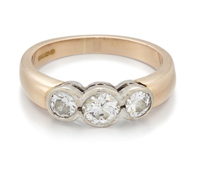 Lot 1475 - AN 18 CARAT GOLD OLD-CUT DIAMOND THREE STONE RING