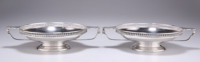 Lot 1171 - A PAIR OF GEORGE V SILVER TWO-HANDLED BON-BON DISHES