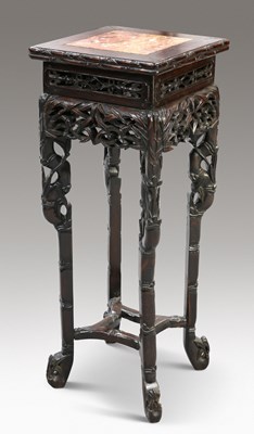 Lot 477 - A CHINESE MARBLE-INSET HARDWOOD JARDINIÈRE STAND