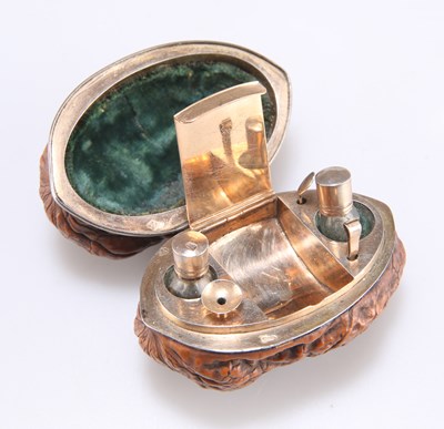 Lot 292 - A FRENCH SILVER-GILT MOUNTED WALNUT-SHELL ETUI