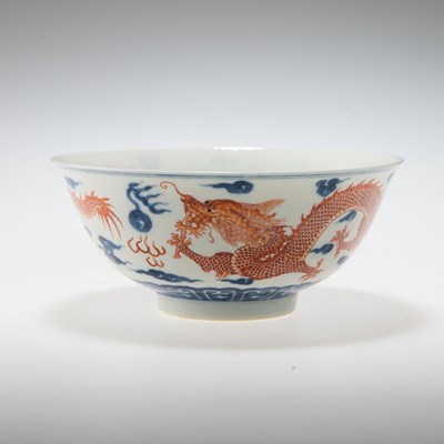 Lot 225 - A CHINESE UNDERGLAZE BLUE AND IRON-RED DECORATED 'DRAGON' BOWL