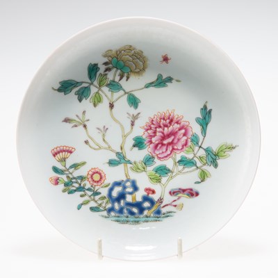 Lot 144 - A CHINESE FAMILLE ROSE 'PEONY' DISH