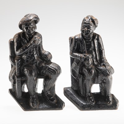 Lot 60 - A PAIR OF VICTORIAN CAST IRON DOORSTOPS