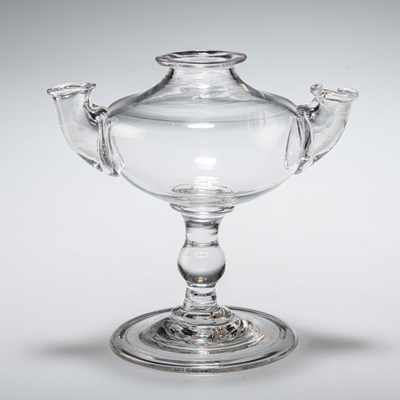 Lot 36 - A DOUBLE-SPOUT GLASS OIL LAMP, CIRCA 1790