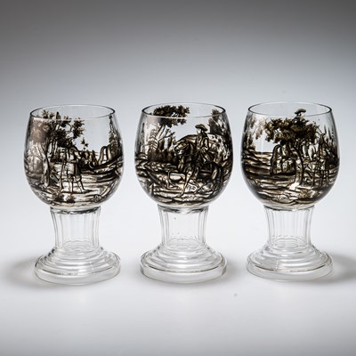 Lot 43 - ATTRIBUTED TO JOSEF LENHARDT OF STEINSCHÖNAU, THREE SCHWARZLOT GLASS GOBLETS