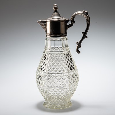 Lot 38 - A SILVER-PLATE MOUNTED CLARET JUG