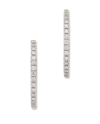 Lot 1480 - A PAIR OF 18 CARAT WHITE GOLD DIAMOND HOOP EARRINGS