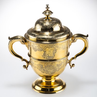 Lot 1356 - A GEORGE II SILVER-GILT TWO-HANDLED CUP AND COVER