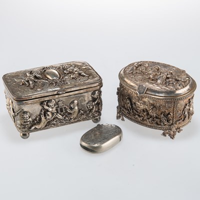 Lot 1047 - TWO 19TH CENTURY FRENCH WHITE-METAL JEWEL CASKETS AND AN EDWARDIAN SILVER-PLATED VESTA CASE