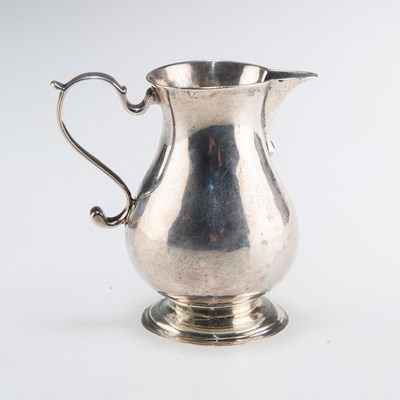 Lot 1355 - A GEORGE II SILVER SPARROW-BEAK CREAM JUG