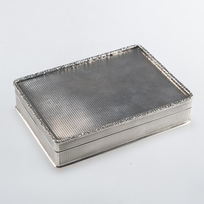 Lot 1166 - A GEORGE V SILVER CIGARETTE BOX