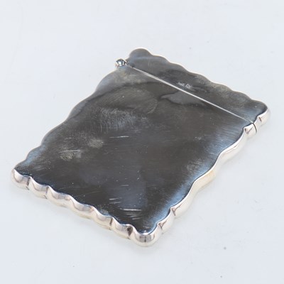 Lot 1204 - AN EDWARDIAN SILVER CARD CASE