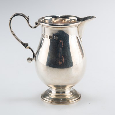 Lot 1167 - A GEORGE V BRITANNIA STANDARD SILVER CREAM JUG