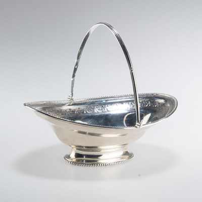 Lot 1306 - A GEORGE III SILVER SWING-HANDLE BASKET