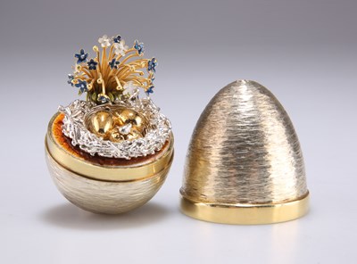 Lot 1096 - STUART DEVLIN: AN ELIZABETH II SILVER-GILT SURPRISE EGG