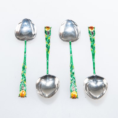 Lot 1195 - A SET OF FOUR ART DECO SILVER AND ENAMEL SPOONS