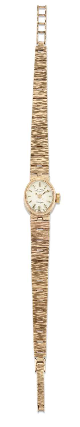 Lot 1378 - A 9 CARAT GOLD ROTARY BRACELET WATCH